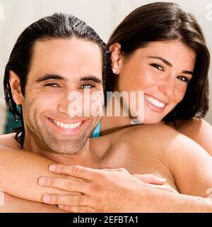 Porträt eines Mitte erwachsenen Mannes und einer jungen Frau, Lächeln Stockfoto