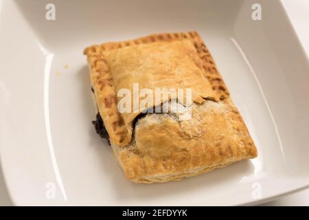 Fertig zum Essen Rinderscheibe auf einem weißen Teller Stockfoto