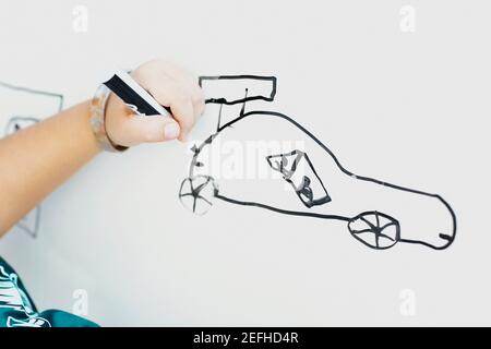 Nahaufnahme einer personŽs Hand, die eine Skizze zeichnet Stockfoto