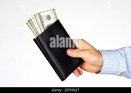 Nahaufnahme einer personÅ½s Hand, die eine Brieftasche hält Stockfoto