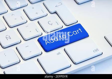 In den Warenkorb auf blauen Computer Tastatur-Taste Stockfoto