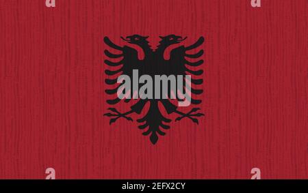 Albanien Flagge mit wehenden Grunge Textur. Vektorhintergrund. Stock Vektor