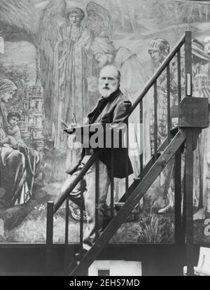 Edward Burne-Jones bei der Arbeit am Stern von Bethlehem, 1895. Frederick Hollyer Aufnahme während der Arbeit des Künstlers am Aquarell Star of Bethlehem im Birmingham Museum and Art Gallery Stockfoto