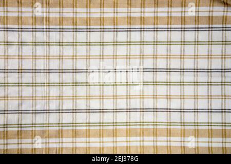 Kariert gewobenen Textur Muster Hintergrund in creme gelb beige Farbe Stockfoto
