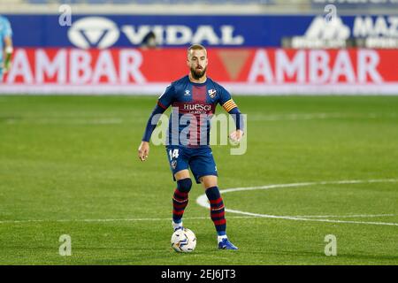 Huesca, Spanien. Februar 2021, 21st. Jorge Pulido (Huesca) Fußball/Fussball : Spanisches 'La Liga Santander' Spiel zwischen SD Huesca 3-2 Granada CF im Estadio El Alcoraz in Huesca, Spanien . Quelle: Mutsu Kawamori/AFLO/Alamy Live News Stockfoto