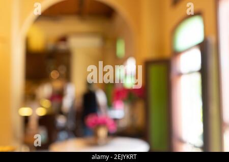 Blur Kaffee und Restaurant Café mit Kunden Hintergrund vintage Ton Farbstil. Stockfoto