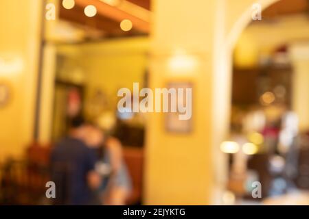Blur Kaffee und Restaurant Café mit Kunden Hintergrund vintage Ton Farbstil. Stockfoto