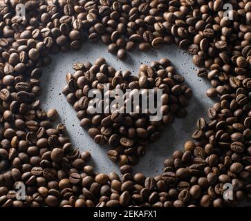 gerösteter Kaffeebohnen können als Hintergrund verwendet werden Stockfoto