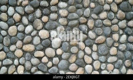 Steinwand mit einer Diamantform in der Mitte Stockfoto