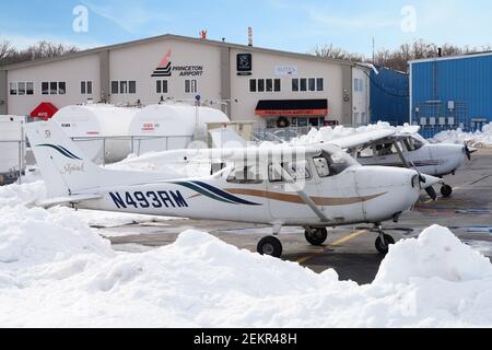 MONTGOMERY, NJ -17 FEB 2021- Winter view of a small airplane at the Princeton Airport (PCT) in Princeton, New Jersey, United States after a snowfall. Stock Photo