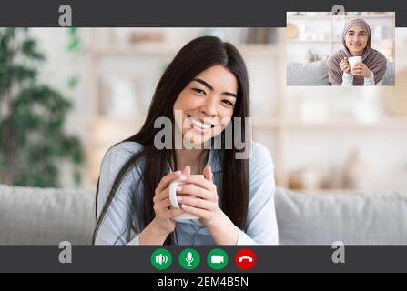 Asiatische Und Muslimische Frauen Tragen Hijab Mit Video-Anruf Stockfoto