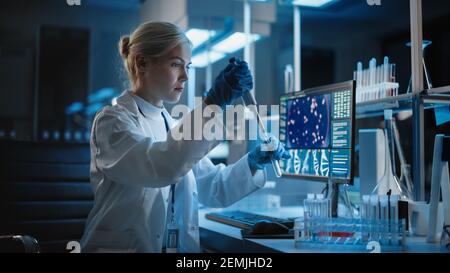 Medizinisches Forschungslabor: Portrait einer Wissenschaftlerin, die mit Proben arbeitet, mit Mikropipette, die Probe analysiert. Advanced Scientific Lab für Stockfoto