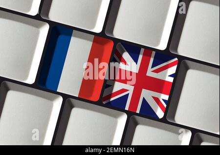 Tastatur mit Französisch Frankreich und Englisch Flagge Sprache lernen Übersetzung Stockfoto