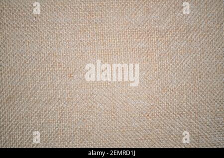 Raue Jute Textur Quappe Hintergrund in beige Farben, natürliche Textil-Muster. Sacktuch oder Verpackungsmaterial. Vintage grungy Hintergrund Stockfoto