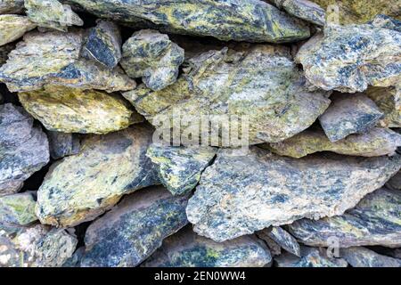 Jadeit Stein Mauerwerk und natürliche Schutt Stein Textur, Jadeit Schutt Stein Hintergrund Stockfoto