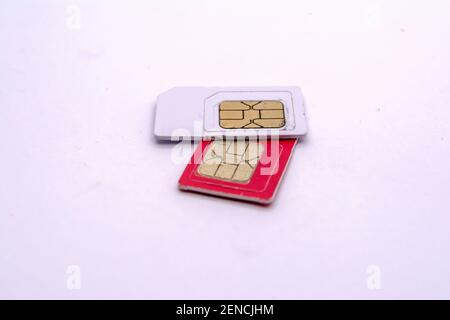 Teilnehmer-ID-Modul oder SIM-Karte. SIM-Karte in verschiedenen Größen isoliert auf weißem Hintergrund. Mini, micro, nano sim. gsm-Chip. Stockfoto