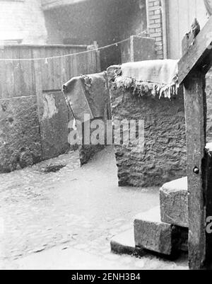 Lappen Teppiche, Slum Hinterhof, viktorianische Zeit Stockfoto