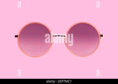 Pink eine violette Retro Psychedelic runde Sonnenbrille Stockfoto