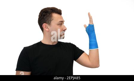 Der Mensch sieht Gips auf weißem Hintergrund Stockfoto