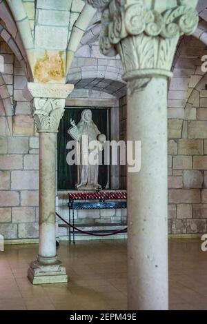 Statue von Christus in den Kreuzgängen des 12th. Jahrhunderts Antike spanische Kloster St. Bernard de Clairvaux nach North Miami, Florida verlegt. Stockfoto