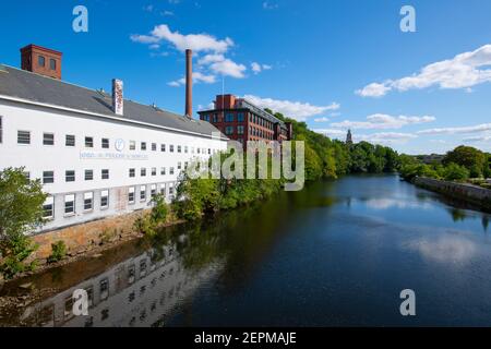 Historisches Wilkinson Mill Gebäude in Old Slater Mill National Historic Landmark auf Roosevelt Avenue in der Innenstadt von Pawtucket, Rhode Island RI, USA. Stockfoto