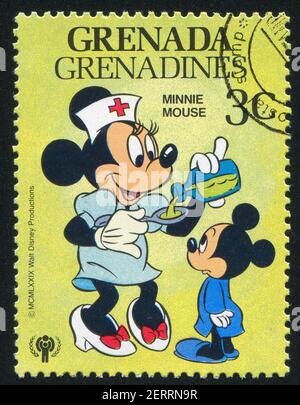 GRENADA - UM 1979: Stempel gedruckt von Grenada, zeigt Disney Figuren, um 1979 Stockfoto