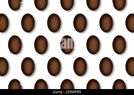 Schokoladen-Ostereier-Muster auf weißem Hintergrund. Stockfoto