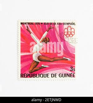 01.03.2021 Istanbul Türkei. Guinea Republik Briefmarke. Um 1976. Olympische Sommerspiele 1976 in Montreal. Gymnastik Stockfoto