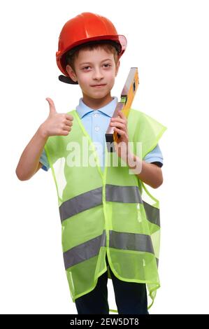 Kind Boy mit Konstruktion Ebene Weste und Helm isoliert auf weiß zeigt Daumen nach oben Geste, zukünftige Bauarbeiter Stockfoto