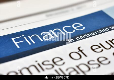 Heading a Finance in the Newpaper. Concept Finance. Stockfoto