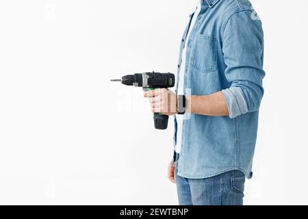 Handwerker, Hausrenovierung, Elektrowerkzeug für Arbeit Stockfoto