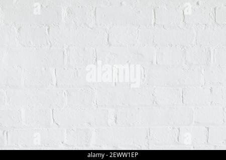 Weiße Ziegelwand Textur, Ziegelwand Hintergrund, gemalte Mauerwerk Fassade, Großbritannien Stockfoto