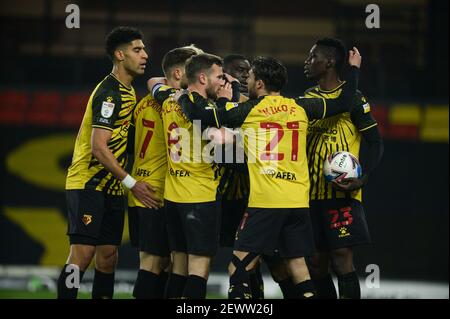 Vicarage Road, Watford, Hertfordshire, Großbritannien. März 2021, 3rd. English Football League Championship Football, Watford gegen Wycombe Wanderers; Watford Spieler feiern Andre Gray von Watford's Tor in der 14th Minute. Kredit: Aktion Plus Sport/Alamy Live Nachrichten Stockfoto