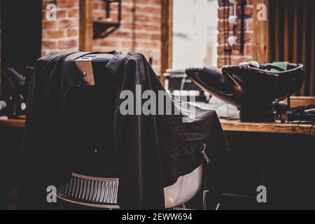 Moderner Friseur und Friseursalon, Barbershop für Männer Barbershop Sessel. Stockfoto