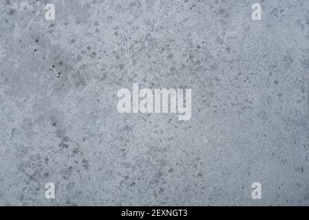 Grauer Hintergrund mit Betonstruktur. Stockfoto