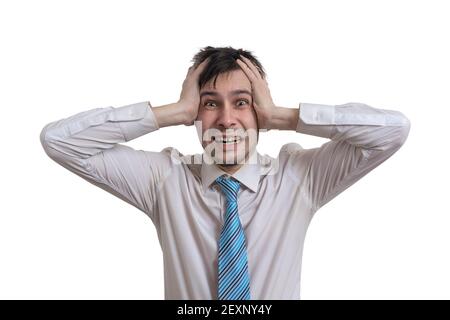 Gestresster junger Geschäftsmann hält seinen Kopf. Isoliert auf weißem Hintergrund. Stockfoto