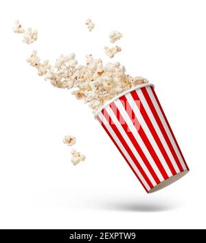 Eimer Popcorn, der auf Weiß spritzt Stockfoto