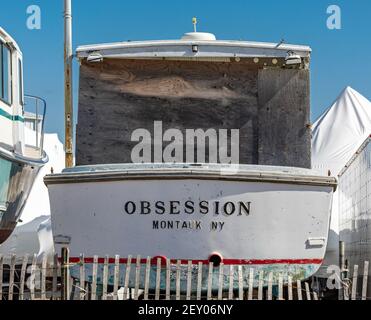 Rückseite eines alten Bootes namens Obsession, Montauk, NY Stockfoto