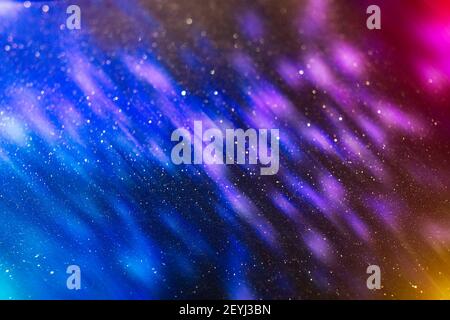 Weihnachten festliche Hintergrund. Verschwommener Weihnachtshintergrund, festlicher mehrfarbiger Bokeh-Hintergrund. Stockfoto