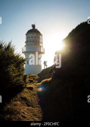 Cape Brett Lighthouse und Cape Brett Hut in Rawhiti New Seeland Stockfoto