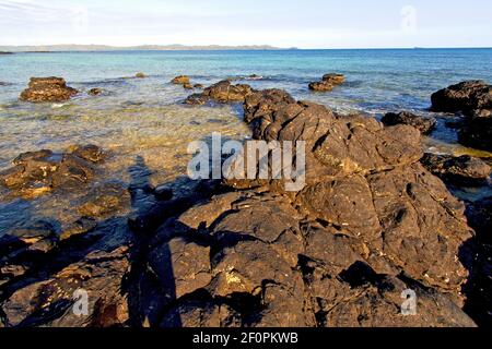 Madagaskar andilana Strand Algen und Felsen Stockfoto