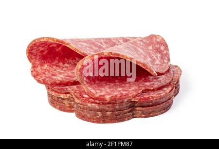 Scheiben Salami auf weißem Hintergrund. Stockfoto