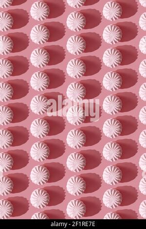 Muster auf einem rosa Marshmallow Hintergrund Stockfoto