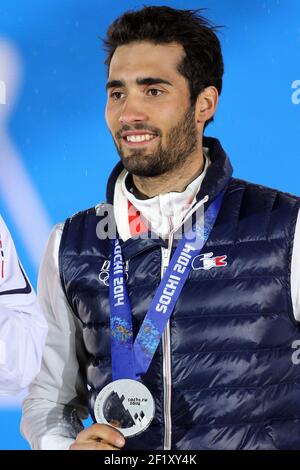 Biathlon Men's Mass Start Podium, Martin Fourcade aus Frankreich ist Silbermedaille auf dem Platz Medaillen während der XXII Olympischen Winterspiele Sotchi 2014, Tag 11, am 18. Februar 2014 in Sotschi, Russland. Fotopool KMSP / DPPI Stockfoto