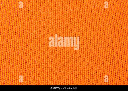Bild von orange Stoff Hintergrund gestrickt aussehen Stockfoto