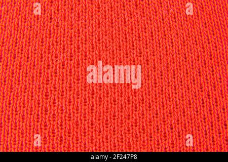 Bild von roten Stoff gestrickt aussehen Hintergrund Stockfoto