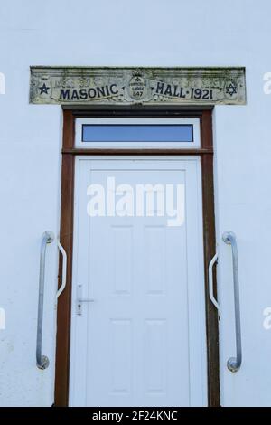 Plakette der Freimaurerhalle an der Wand in der Stadt Honiton Devon, Großbritannien Stockfoto