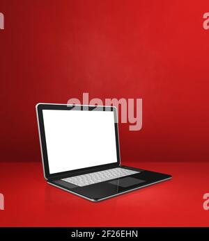 Laptop-Computer im Hintergrund der roten Büroszene Stockfoto