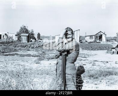 Arkansas Mutter kommt nach Kalifornien für einen Neuanfang, mit Ehemann und elf Kindern. Jetzt eine ländliche Rehabilitation Client. Tulare County, Kalifornien. November 1938. Foto von Dorothea lange Stockfoto