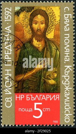 BULGARIEN - UM 1988: Eine in Bulgarien gedruckte Briefmarke, zeigt die Ikone von Bjala Poljana, die den Heiligen Johannes den Täufer darstellt, um 1988 Stockfoto
